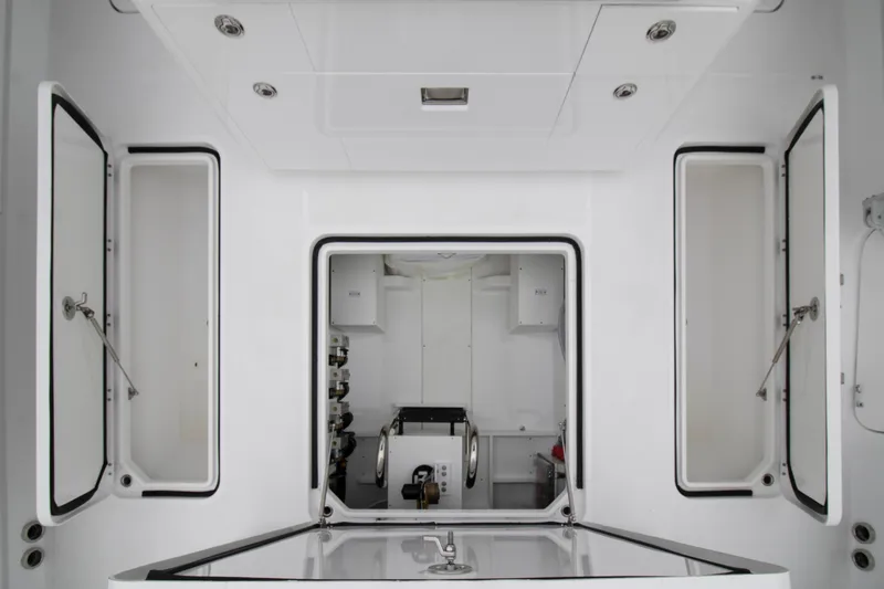 Slide: The Image of Engine room of 2025 HCB 42 Lujo boat, showcasing modern design and equipment. - 22