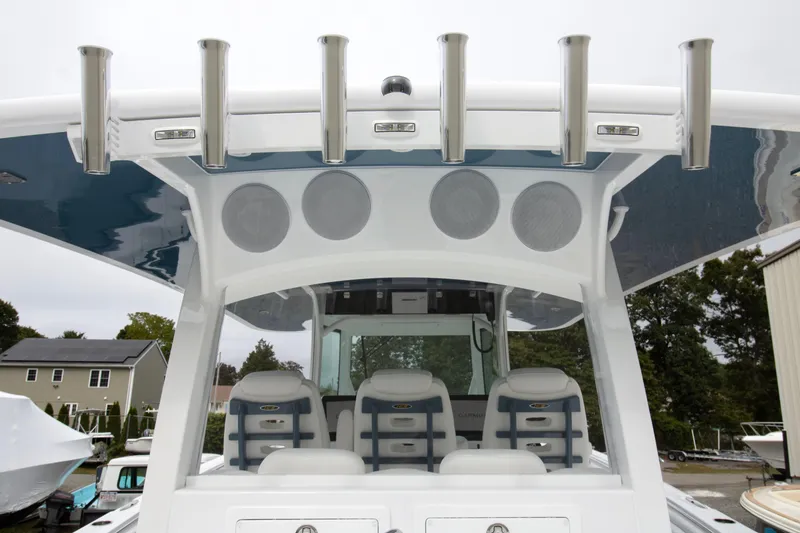 Slide: The Image of 2025 HCB 42 Lujo boat interior with rod holders and seating. - 27