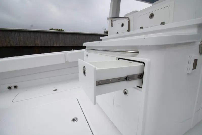 Slide: The Image of 2025 HCB 42 Lujo boat interior with open storage drawer. - 30
