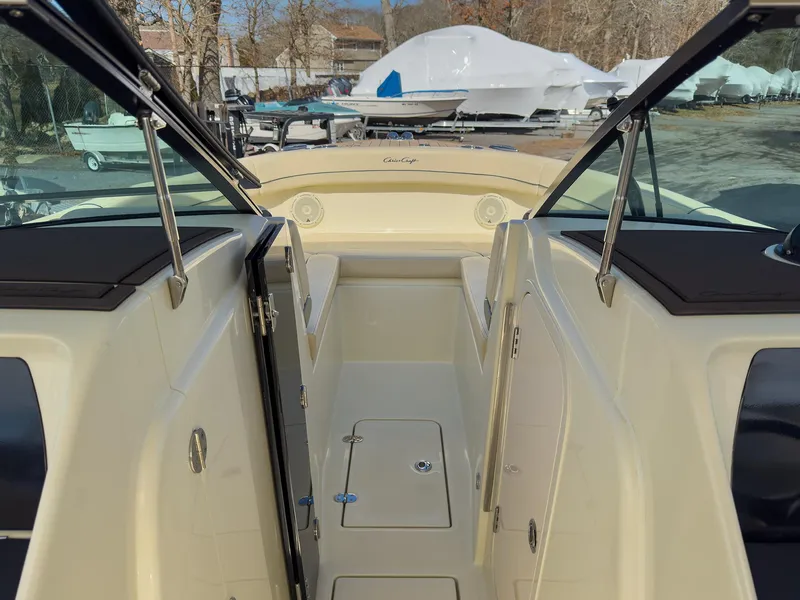 Slide: The Image of 2024 Chris-Craft 24 CALYPSO boat interior with open deck and seating area. - 19