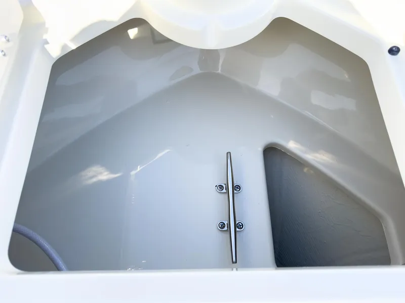 Slide: The Image of 2024 Chris-Craft 24 CALYPSO boat interior detail showing storage compartment. - 3