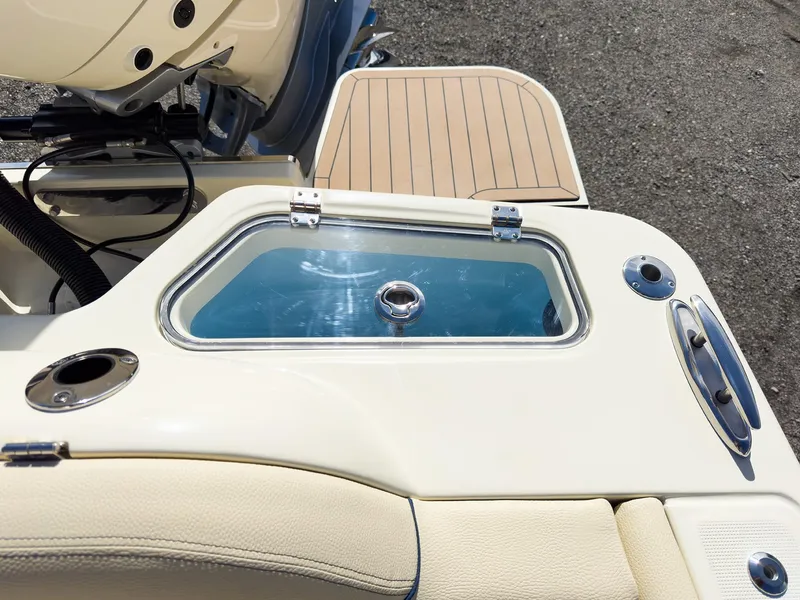 Slide: The Image of 2024 Chris-Craft 24 CALYPSO boat with livewell and cushioned seating. - 7