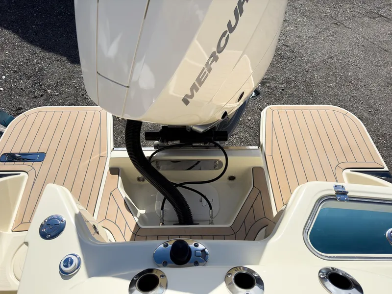 Slide: The Image of 2024 Chris-Craft 24 CALYPSO boat stern with Mercury outboard motor. - 8
