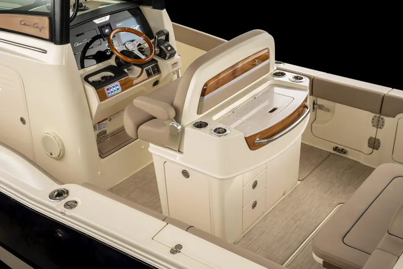 Slide: The Image of 2024 Chris-Craft Catalina boat interior with elegant dashboard and seating. - 20