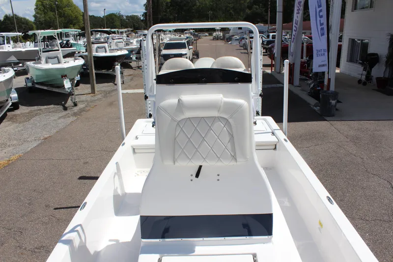 Slide: The Image of 2024 Blue Wave 2200 STL boat interior at a dealership. - 9