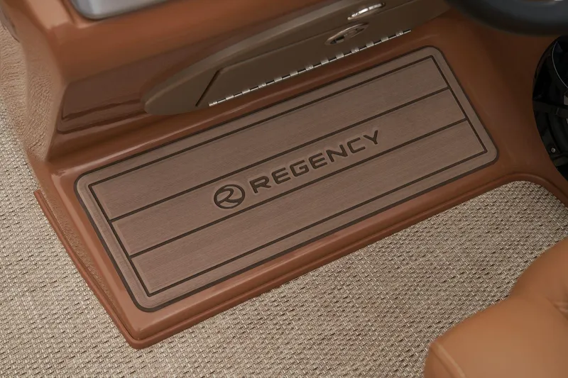 Slide: The Image of 2024 Regency 250 LE3 boat interior floor mat with logo. - 33
