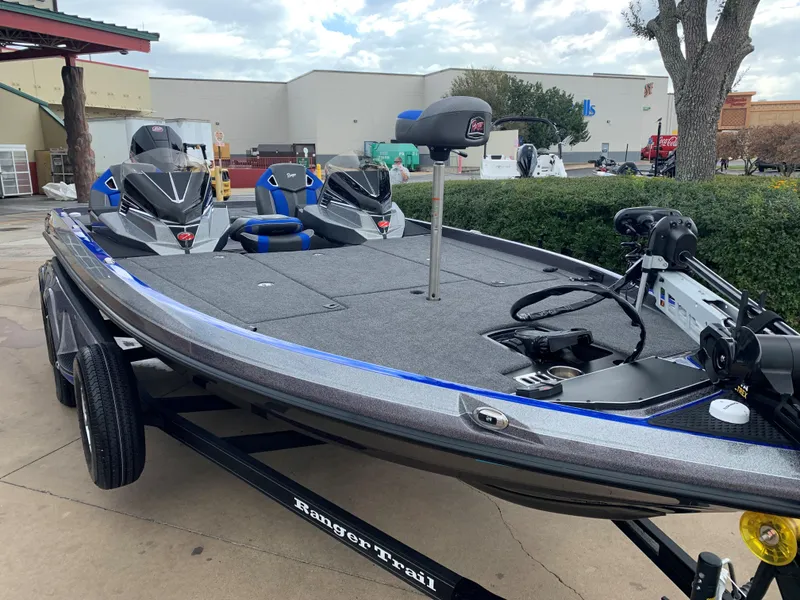 Slide: The Image of 2024 Ranger Z520R bass boat on trailer, parked outdoors. - 3