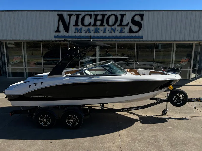 Slide: The Image of 2024 Chaparral 21 SSI SF boat on trailer at Nichols Marine dealership. - 1