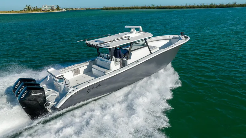 Slide: The Image of 2023 Yellowfin 42 boat cruising on open water. - 20