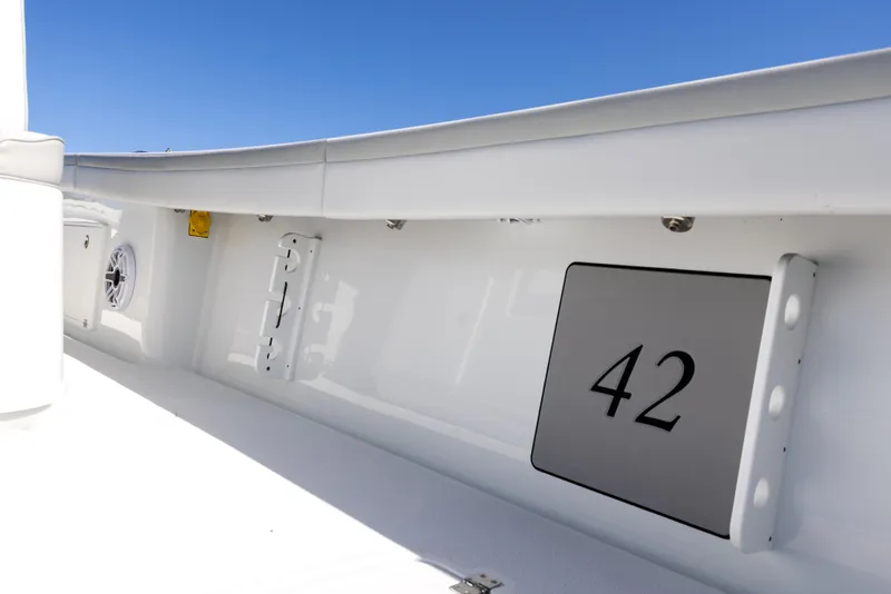 Slide: The Image of 2023 Yellowfin 42 boat interior with white finish and model number displayed. - 31