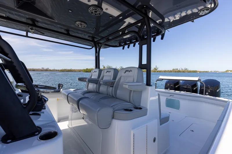 Slide: The Image of 2023 Yellowfin 42 boat interior with seating and ocean view. - 40