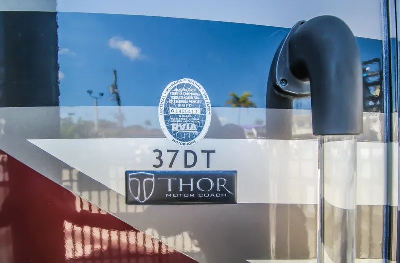 Slide: The Image of 2012 Thor Motor Coach 37DT exterior badge and logo - 22