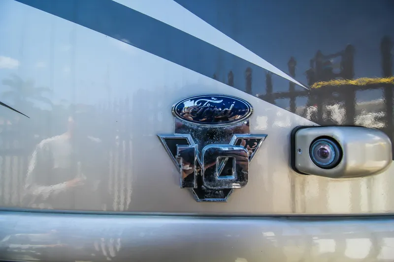 Slide: The Image of 2012 Thor 37DT rear emblem and backup camera. - 23