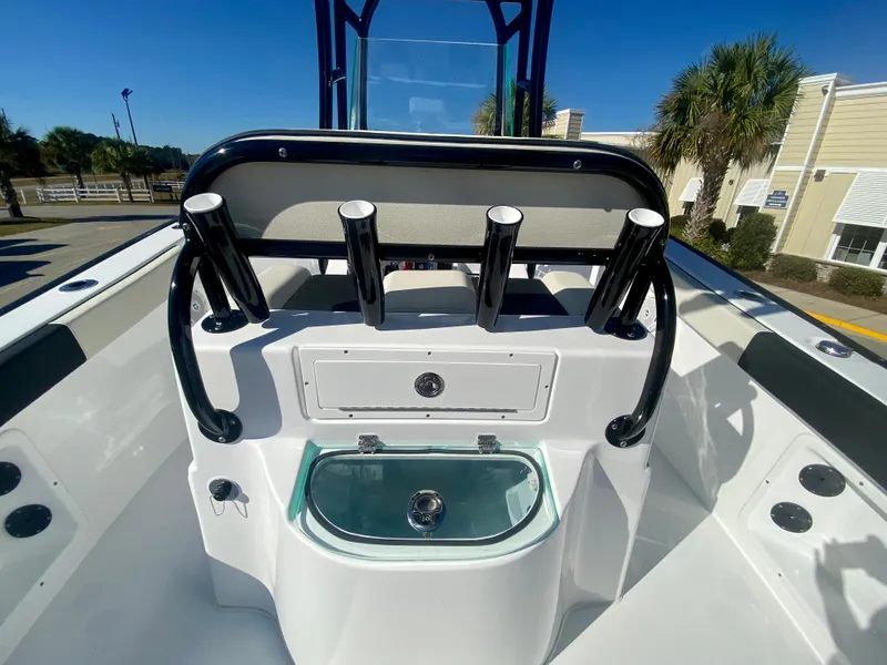 Slide: The Image of 2024 Cape Horn 22OS boat console with rod holders and livewell. - 10
