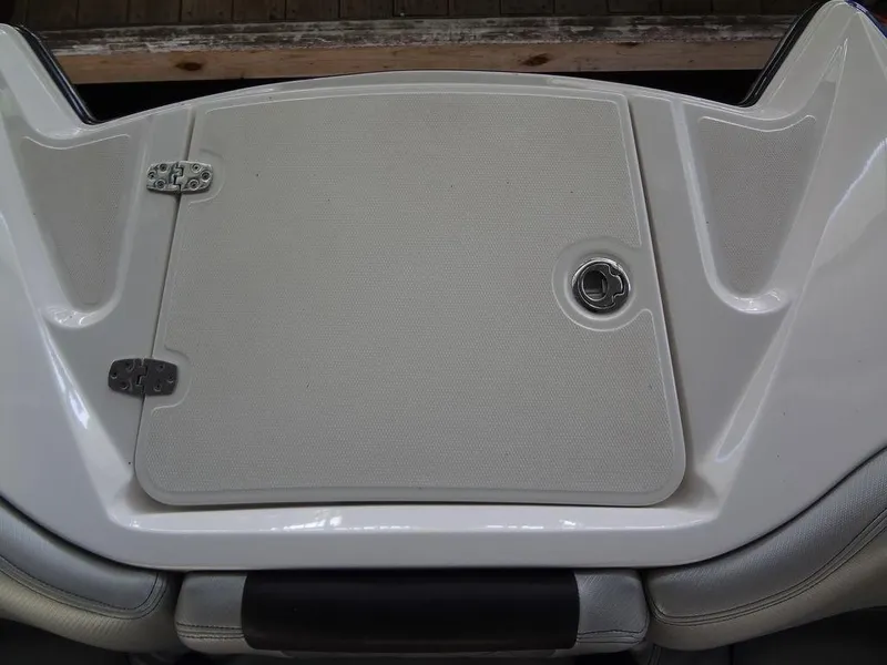 Slide: The Image of 2013 MasterCraft X55 boat stern with swim platform and diamond-patterned mat. - 13