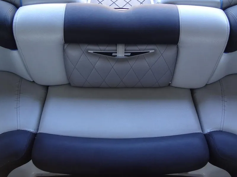 Slide: The Image of 2013 MasterCraft X55 boat interior seating with black and gray upholstery. - 20