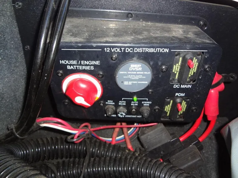 Slide: The Image of 2013 MasterCraft X55 boat captain's seat with black and white upholstery. - 30