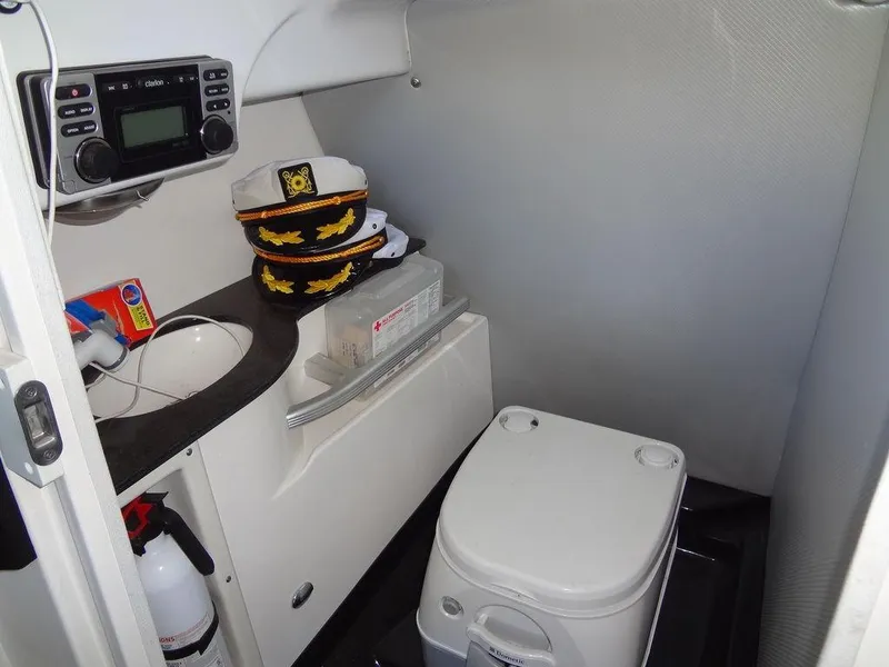 Slide: The Image of MasterCraft X55 2013 boat control panel displaying ballast tank settings. - 42