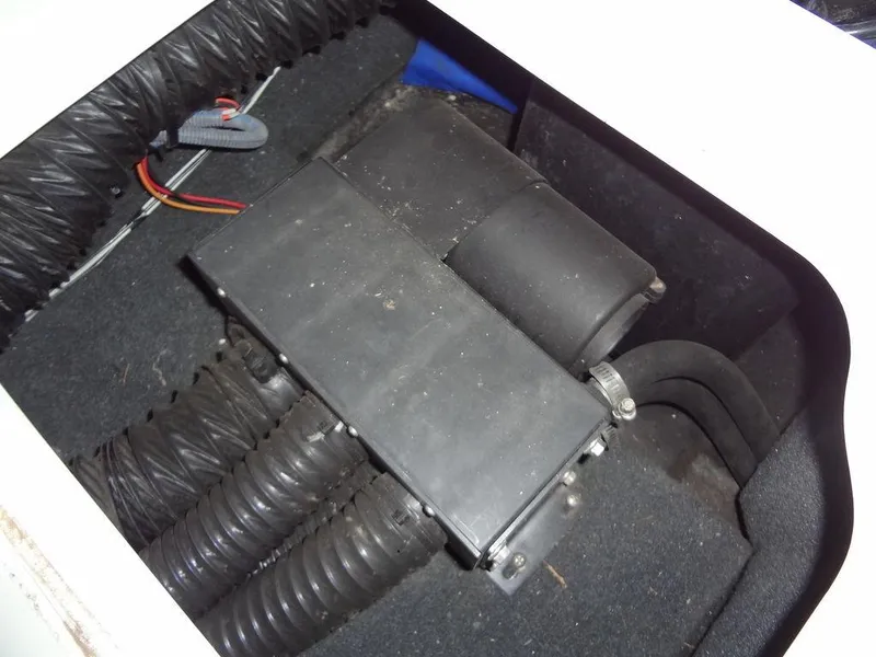 Slide: The Image of Open storage drawer in 2013 MasterCraft X55 boat with branded case. - 43