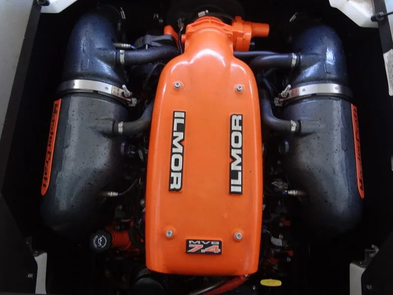 Slide: The Image of 2013 MasterCraft X55 boat interior with cup holders and storage. - 47