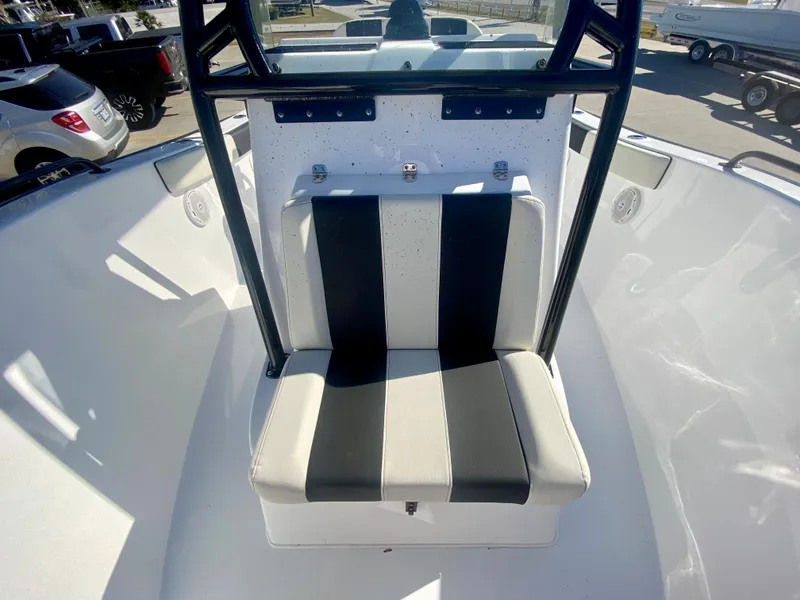 Slide: The Image of 2024 Cape Horn 22OS boat with black and white striped seating. - 20