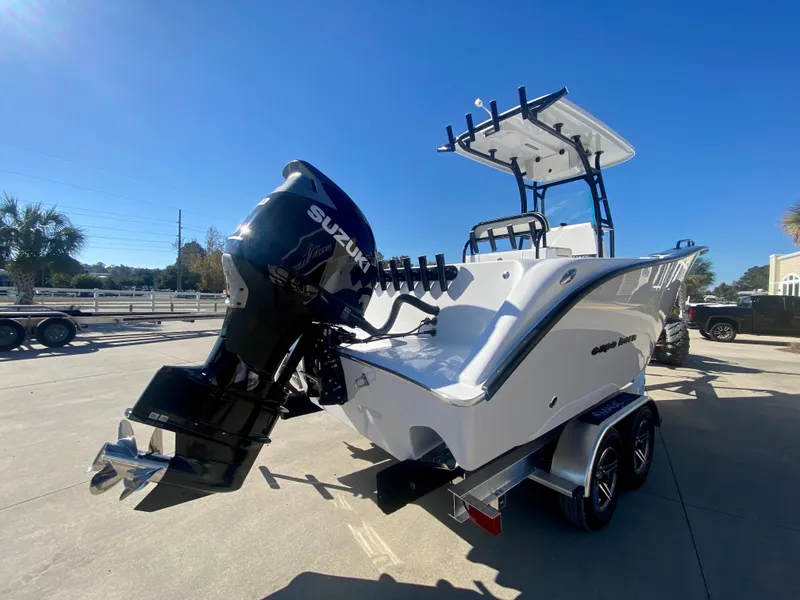 Slide: The Image of 2024 Cape Horn 22OS boat with Suzuki outboard motor on trailer. - 3