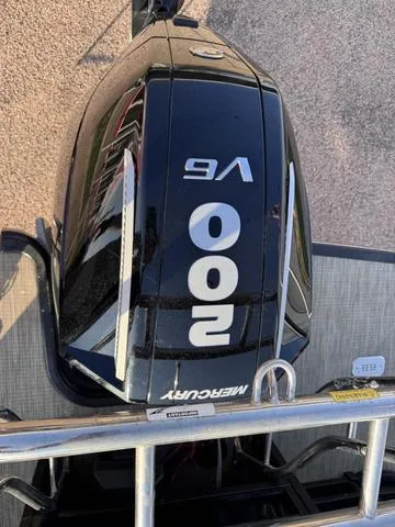 Slide: The Image of Mercury 200 V6 outboard motor on 2023 Starcraft CX23FD boat. - 5