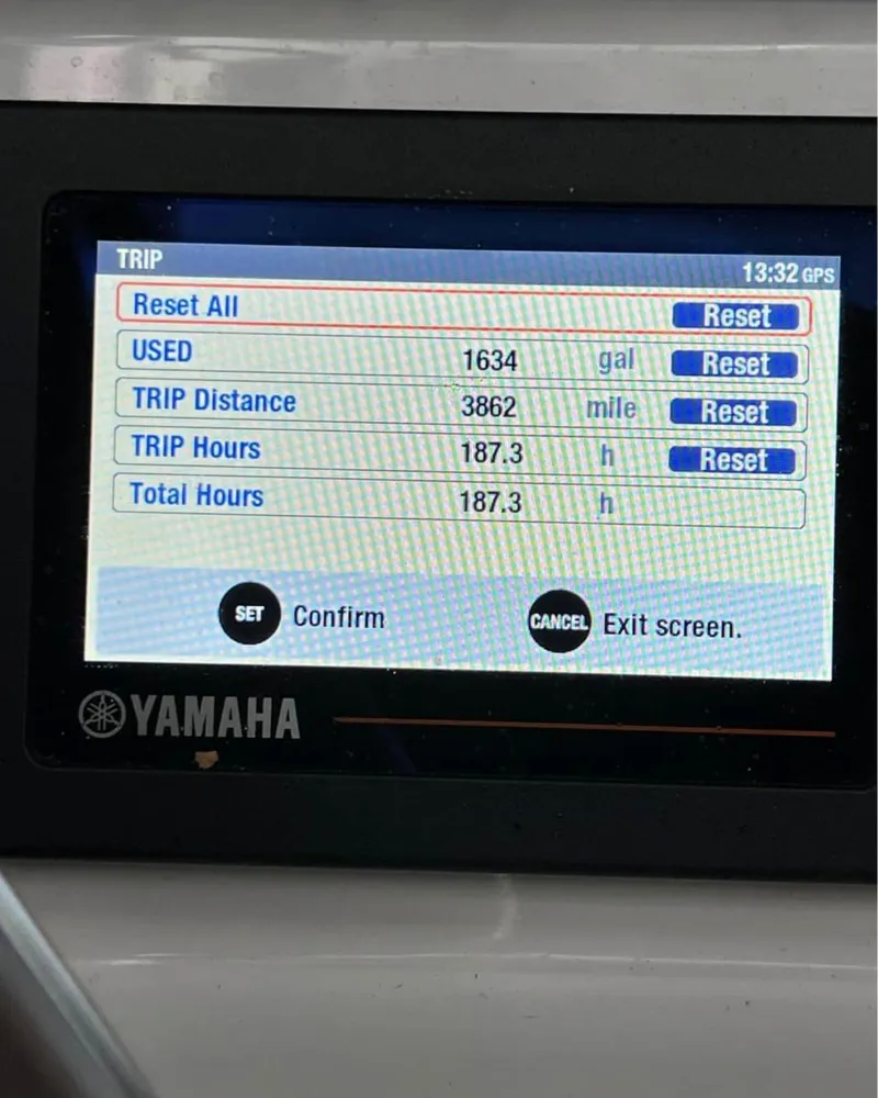 Slide: The Image of Yamaha trip monitor display on a 2018 Sea Hunt 235 boat showing trip data. - 7