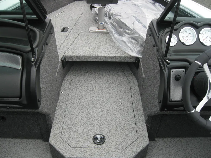Slide: The Image of Storage compartment of 2024 Lund 1775 Crossover XS boat with manual. - 15