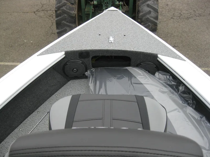 Slide: The Image of 2024 Lund 1775 Crossover XS boat interior storage compartment. - 18