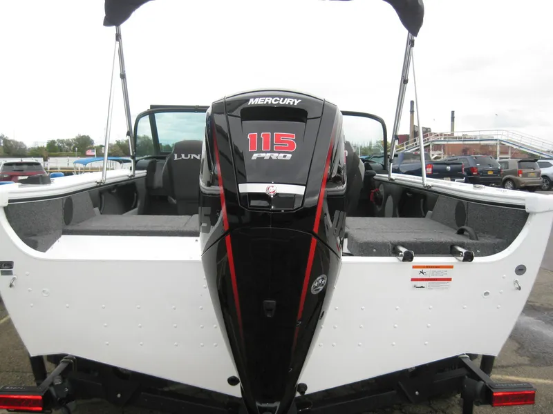 Slide: The Image of 2024 Lund 1775 Crossover XS boat with Mercury 115 Pro XS outboard motor. - 6