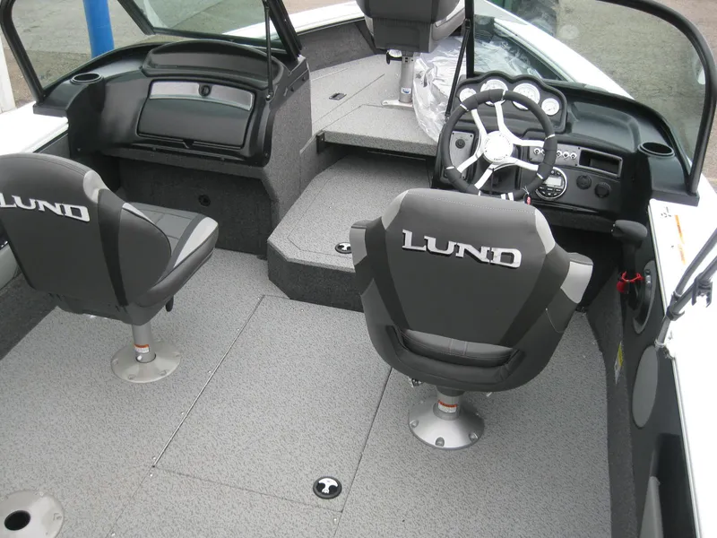 Slide: The Image of 2024 Lund 1775 Crossover XS boat with Mercury 115 Pro outboard motor. - 7