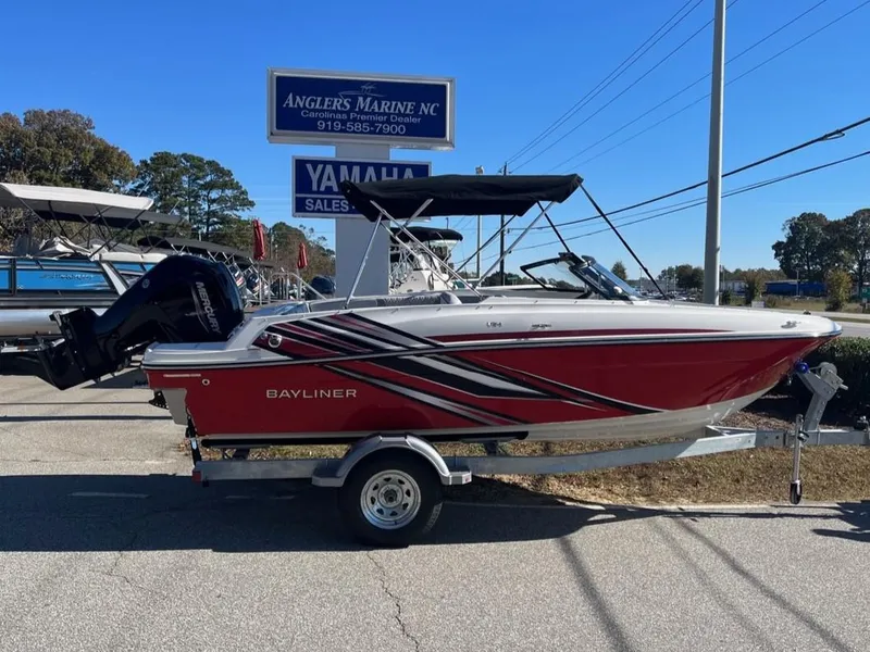Slide: The Image of 2024 Bayliner VR4 boat in red on a trailer at Anglers Marine NC. - 0
