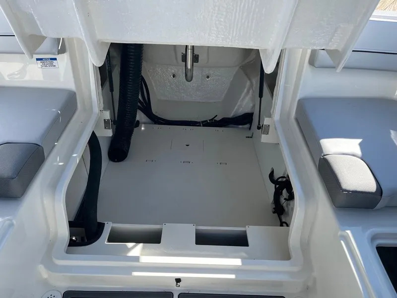 Slide: The Image of 2024 Bayliner VR4 boat interior storage compartment. - 11