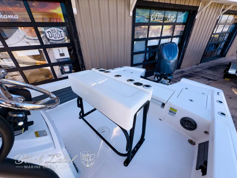 Slide: The Image of 2024 Pathfinder TRS 2200 boat interior with seating and steering wheel. - 15