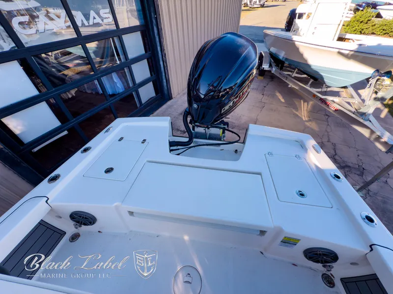 Slide: The Image of 2024 Pathfinder TRS 2200 boat with outboard motor, displayed at Black Label Marine Group. - 28