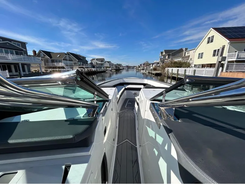 Slide: The Image of 2019 Monterey 385 SE boat docked in a residential canal. - 13