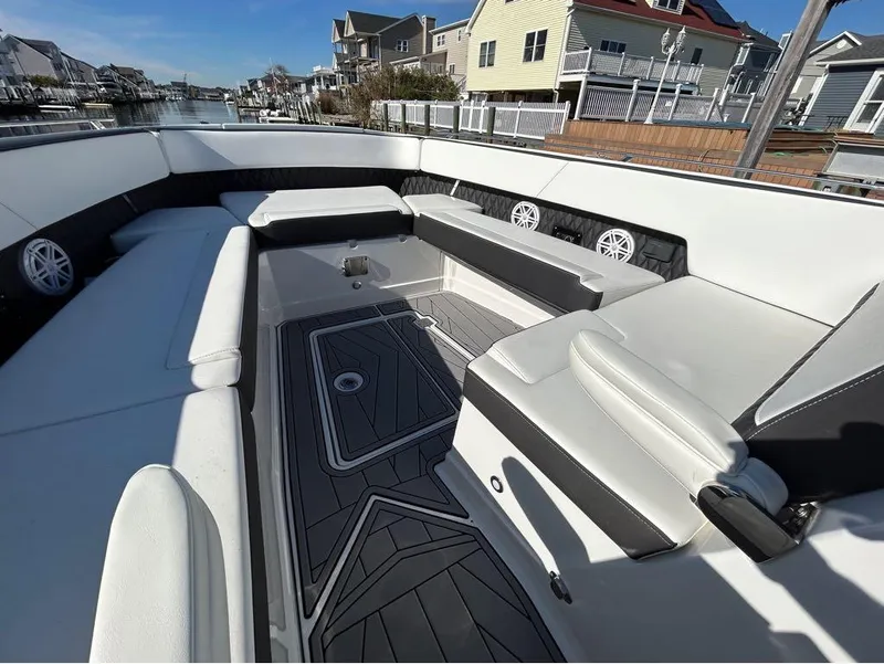 Slide: The Image of 2019 Monterey 385 SE boat interior with spacious seating and modern design. - 16