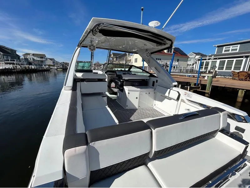 Slide: The Image of 2019 Monterey 385 SE boat docked in a residential marina. - 4