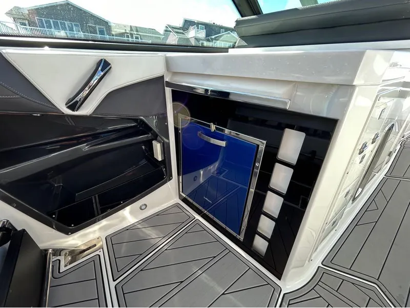 Slide: The Image of Interior of a 2019 Monterey 385 SE boat with modern cabinetry and flooring. - 7