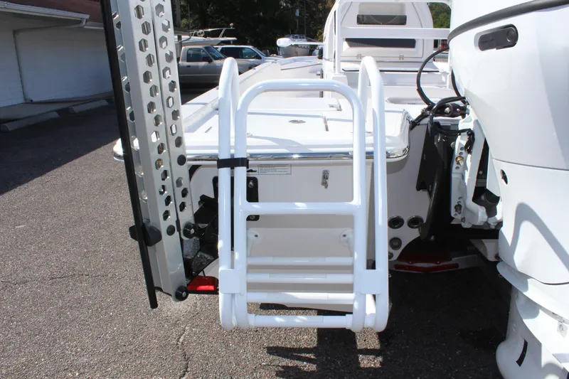 Slide: The Image of 2024 Blue Wave 2200 STL boat with rear ladder and motor mount. - 20