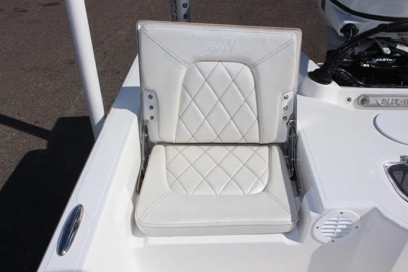 Slide: The Image of 2024 Blue Wave 2200 STL boat seat with white diamond-stitched upholstery. - 33