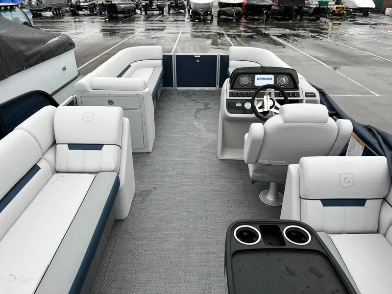 Slide: The Image of 2024 Godfrey SWEETWATER 2286 SB pontoon boat interior with seating and helm. - 11