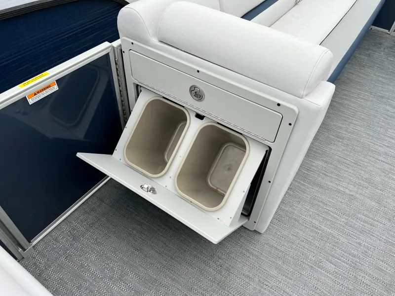 Slide: The Image of Built-in storage compartment on the 2024 Godfrey SWEETWATER 2286 SB boat. - 13