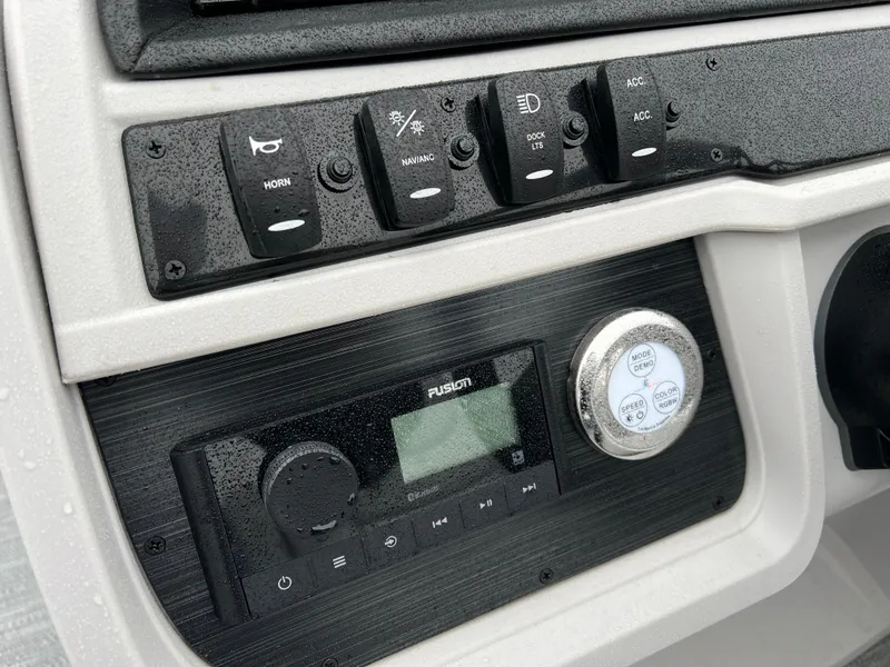 Slide: The Image of Control panel of 2024 Godfrey SWEETWATER 2286 SB boat with Fusion stereo system. - 16