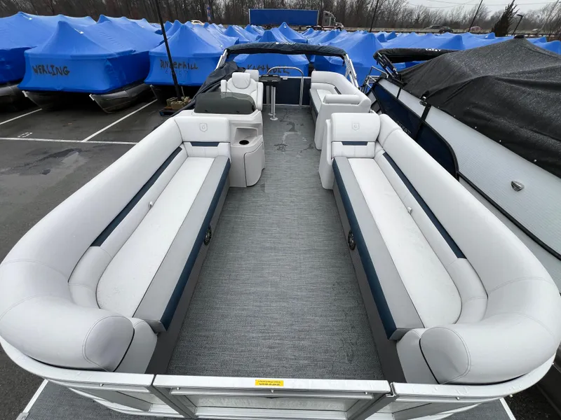 Slide: The Image of 2024 Godfrey SWEETWATER 2286 SB pontoon boat with spacious seating and modern design. - 3