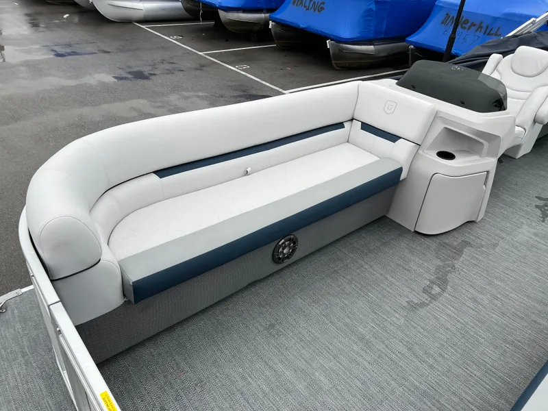 Slide: The Image of 2024 Godfrey SWEETWATER 2286 SB pontoon boat interior with cushioned seating. - 5