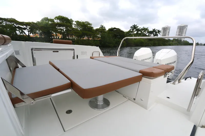 Slide: The Image of Beneteau FLYER 9 SPACE DECK 2022, featuring spacious seating and dual Mercury engines. - 15