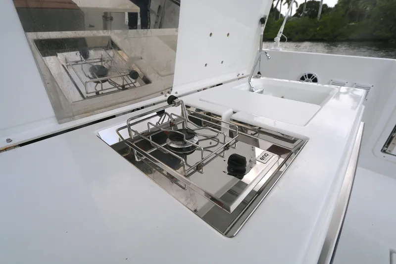 Slide: The Image of Outdoor kitchen on 2022 Beneteau FLYER 9 SPACE DECK boat with stainless steel stove. - 17
