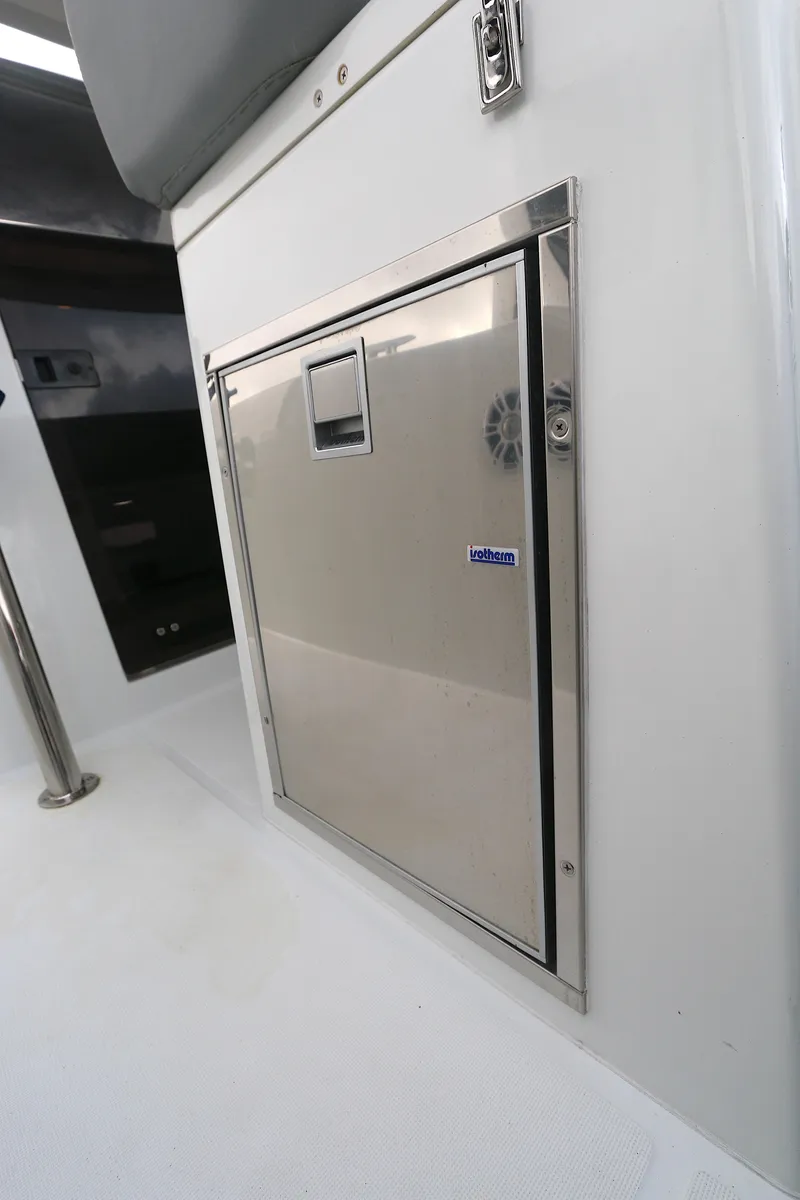 Slide: The Image of 2022 Beneteau FLYER 9 SPACE DECK, stainless steel storage compartment detail. - 18